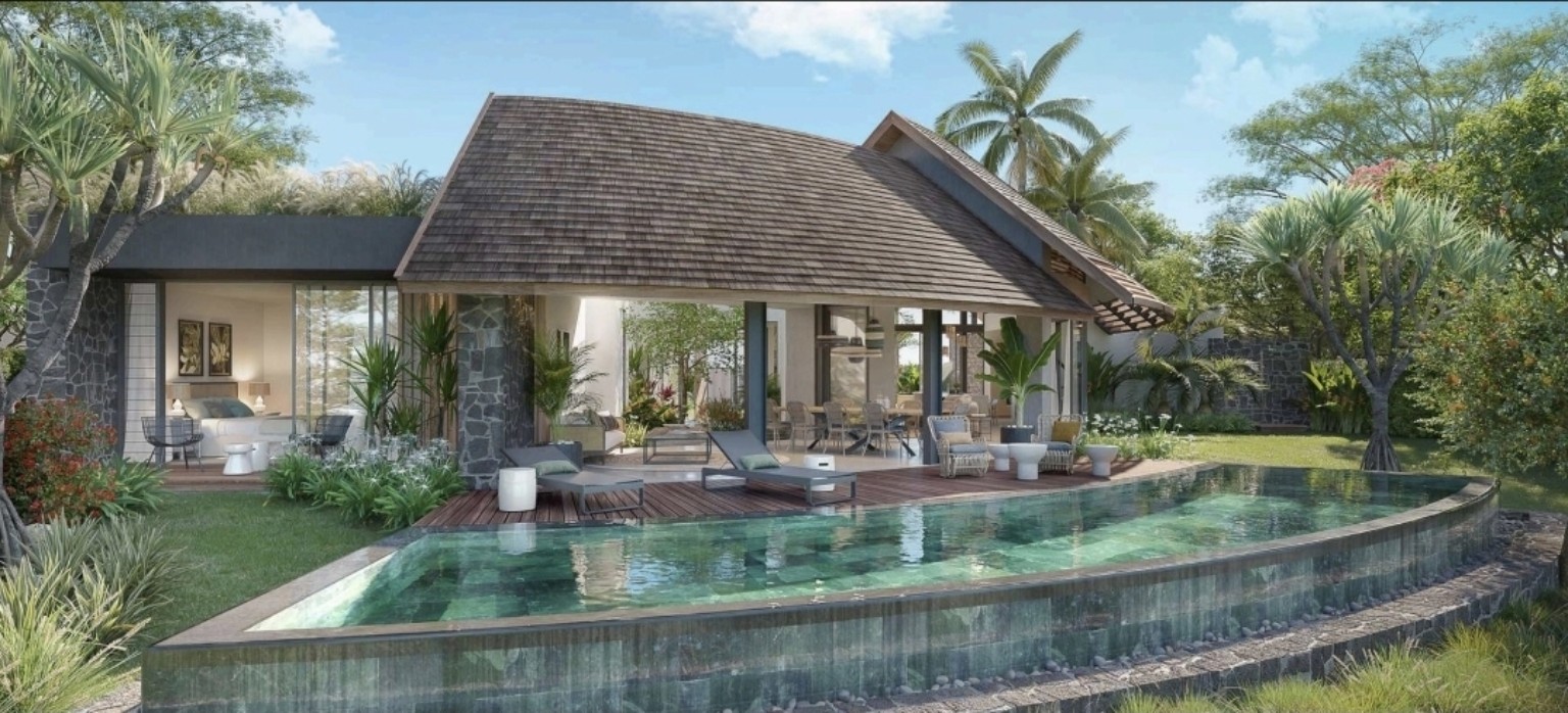 Villa et piscine dans un jardin tropical